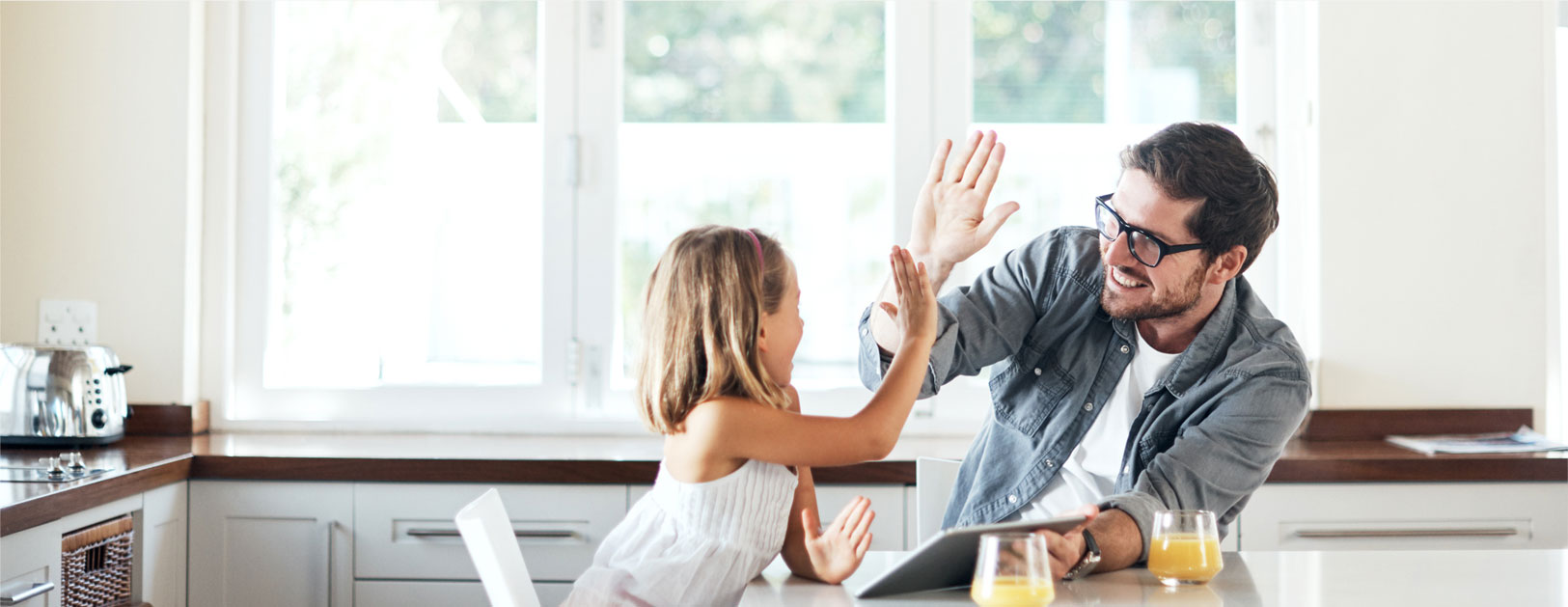 Dad high fives daughter